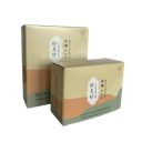 Dos cajas de agujas de acupuntura Cloud & Dragon con diseño beige, verde y naranja. Las cajas están posicionadas una frente a la otra mostrando sus etiquetas impresas en chino e inglés. Fondo transparente.