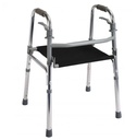 Imagen del andador de aluminio con asiento Foshan FS961L, mostrando el asiento de tela reforzada negra extendido para su uso. El andador es de color plateado y cuenta con mecanismos de botón negros, estructura de aluminio resistente, empuñaduras contorneadas de vinilo negro y regatones antideslizantes negros.